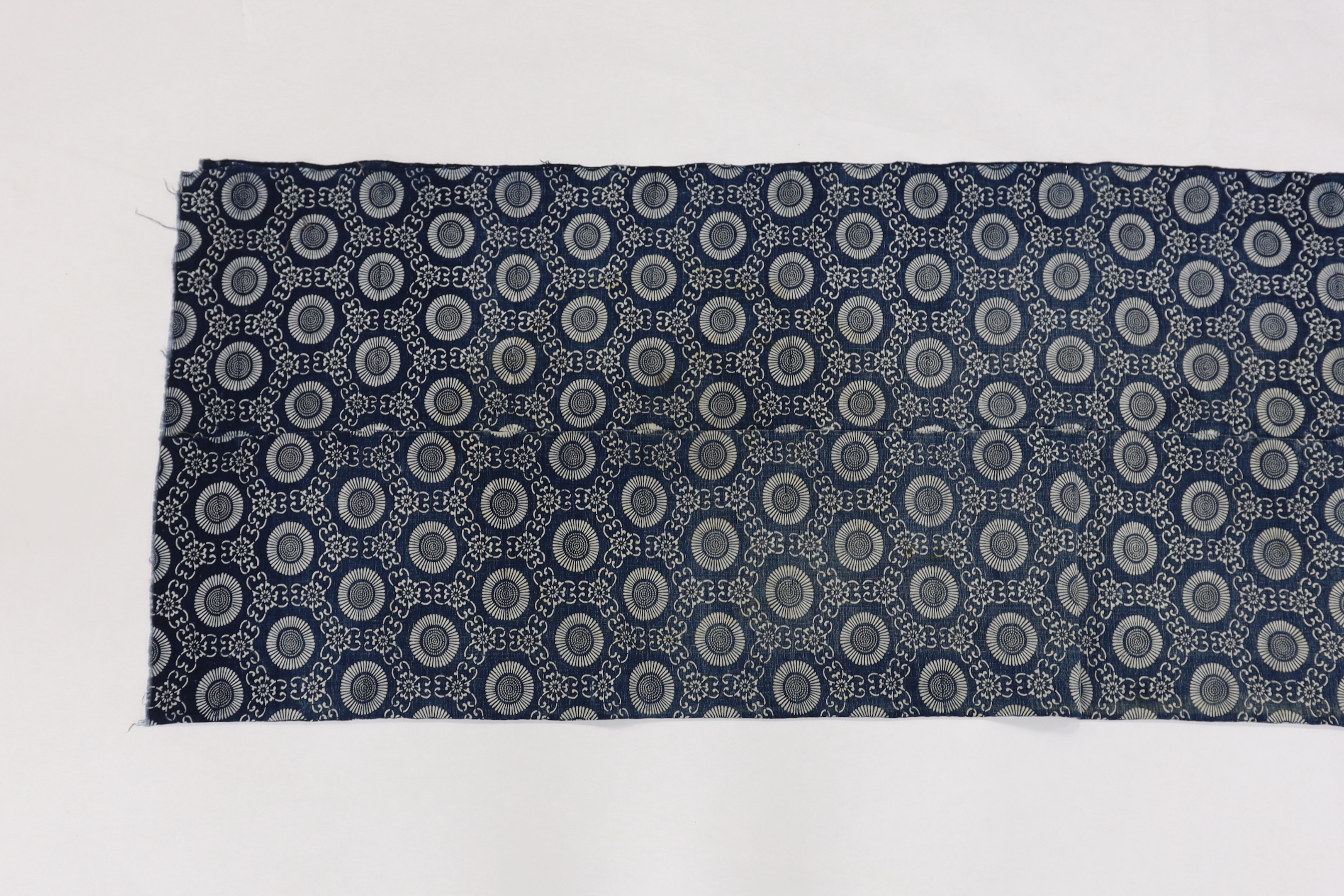 A tablecloth with a wide crocheted border and a blue and white Japanese panel decorated with mons, Japanese fabric 215cm long x 138cm wide (2)